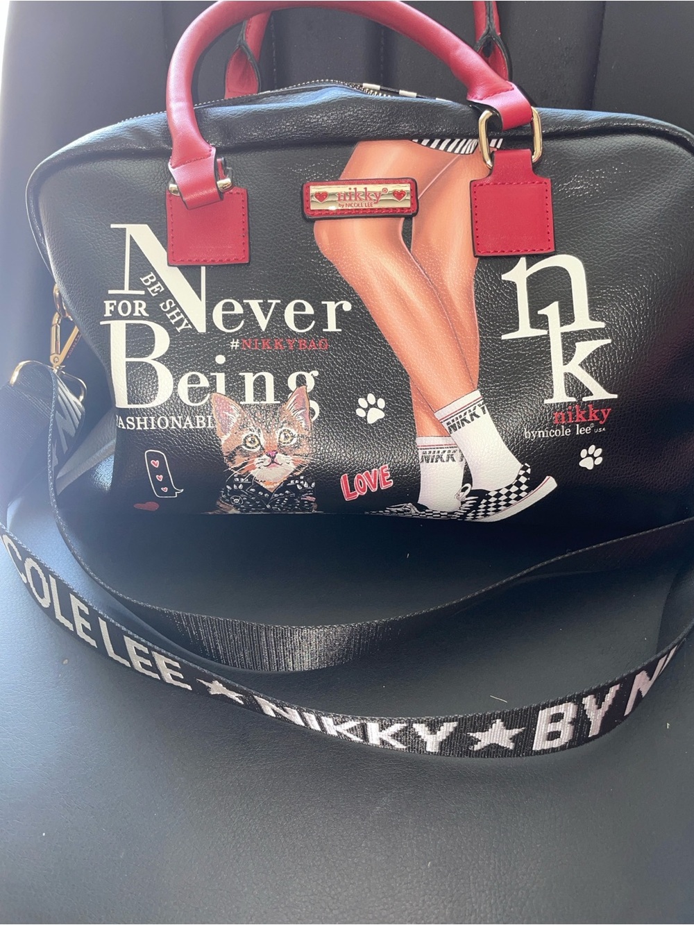 Nicole Lee Black Satchel with Red Handles and Graphic Print